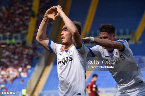 Andrea Conti of Atalanta celebrates scroing first goal during the italian Serie A match between Roma and Atalanta at the Olympic Stadium, Rome, Italy...