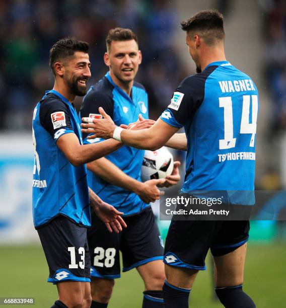 Kerem Demirbay of 1899 Hoffenheim is congratulated after scoring during the Bundesliga match between TSG 1899 Hoffenheim and Borussia...