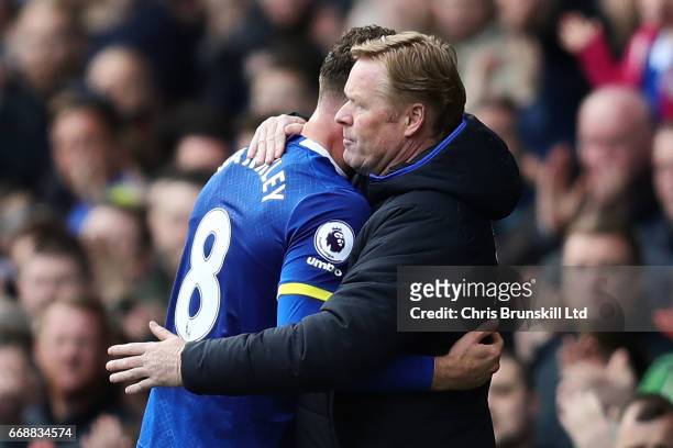 Ross Barkley of Everton is embraced by his Manager / Head Coach Ronald Koeman during the Premier League match between Everton and Burnley at Goodison...