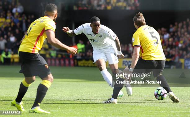 Leroy Fer of Swansea City is challenged by Sebastian Prodl of Watford during the Premier League match between Watford and Swansea City at Vicarage...