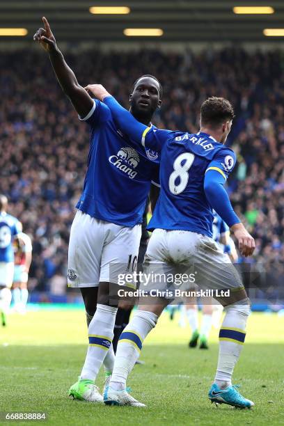 Romelu Lukaku of Everton celebrates scoring his team's third goal to make the score 3-1 with Ross Barkley during the Premier League match between...