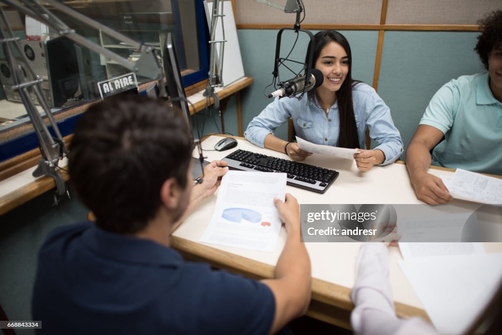 Students broadcasting from the university's radio station
