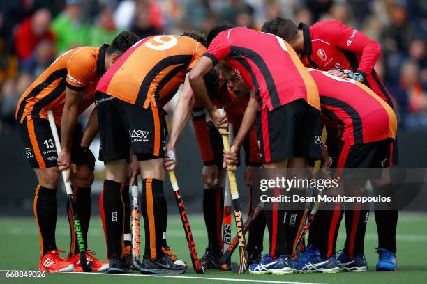 The team of HC Oranje-Rood lead by captain, Robert Van Der Horst and Bob De Voogd huddle during the Euro Hockey League KO16 match between HC...