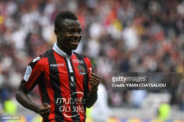 Nice's Ivorian midfielder Jean Michael Seri celebrates after scoring a goal during the French L1 Football match between OGC Nice and AS Nancy...