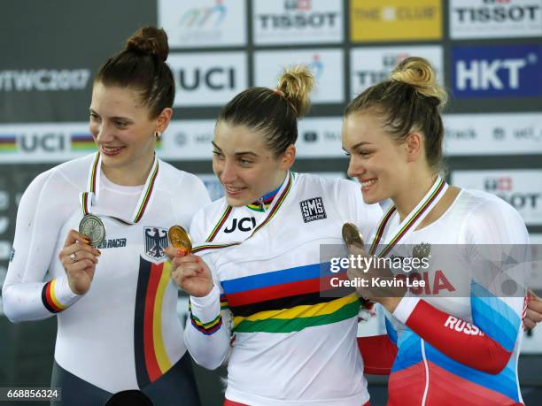 Miriam Welte of Germany, Daria Shmeleva of Russia, and Anastasiia Voinova of Russia pose with their medals after winning Women's Time Trial on Day 4...