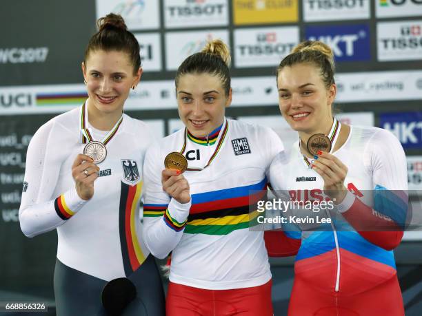 Miriam Welte of Germany, Daria Shmeleva of Russia, and Anastasiia Voinova of Russia pose with their medals after winning Women's Time Trial on Day 4...