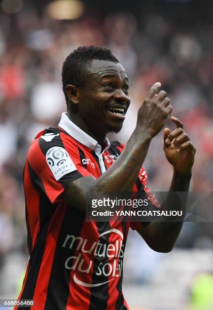 Nice's Ivorian midfielder Jean Michael Seri celebrates after scoring a goal during the French L1 football match OGC Nice vs AS Nancy-Lorraine at the...
