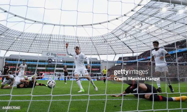 Oemer Toprak of Leverkusen saves the ball on the goal-line during the Bundesliga match between Bayer 04 Leverkusen and Bayern Muenchen at BayArena on...