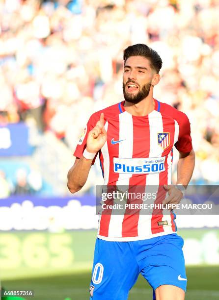 Atletico Madrid's Belgian midfielder Yannick Ferreira Carrasco celebrates his second goal during the Spanish league football match Atletico de Madrid...