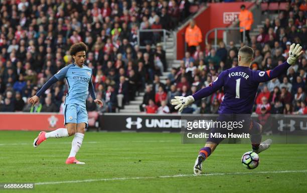 Leroy Sane of Manchester City scores his sides second goal past Fraser Forster of Southampton during the Premier League match between Southampton and...