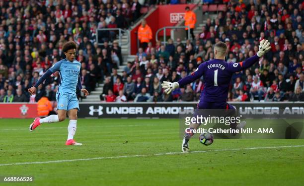 Leroy Sane of Manchester City scores a goal past Southampton goalkeeper Fraser Forster to make it 0-2 during the Premier League match between...