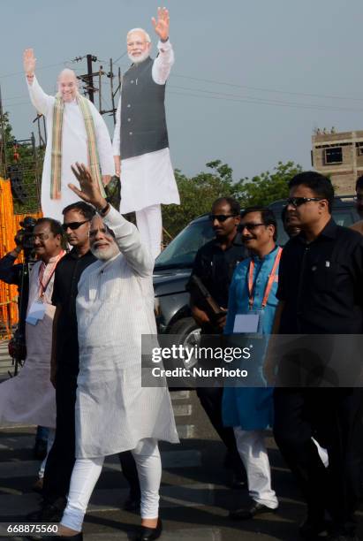 Prime Minister of India Narendra Modi waves to crowd after arrives in the eastern Indian state Odisha's capital city Bhubaneswar on 15 April 2017,...