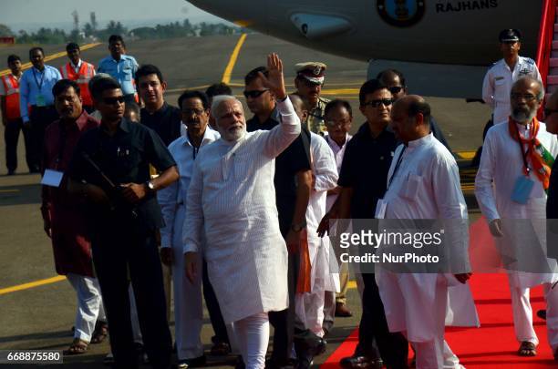 Prime Minister of India Narendra Modi waves to crowd after arrives in the eastern Indian state Odisha's capital city Bhubaneswar on 15 April 2017,...