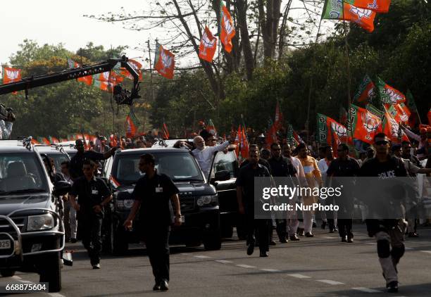 Prime Minister of India Narendra Modi waves to crowd after arrives in the eastern Indian state Odisha's capital city Bhubaneswar on 15 April 2017,...