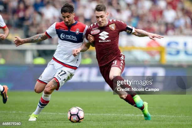 Federico Ceccherini of FC Crotone and Andrea Belotti of Torino FC compete for the ball during the Serie A football match between Torino FC and FC...