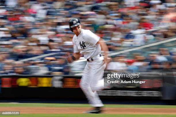 Jacoby Ellsbury of the New York Yankees steals second base during the third inning against the St. Louis Cardinals at Yankee Stadium on April 15,...
