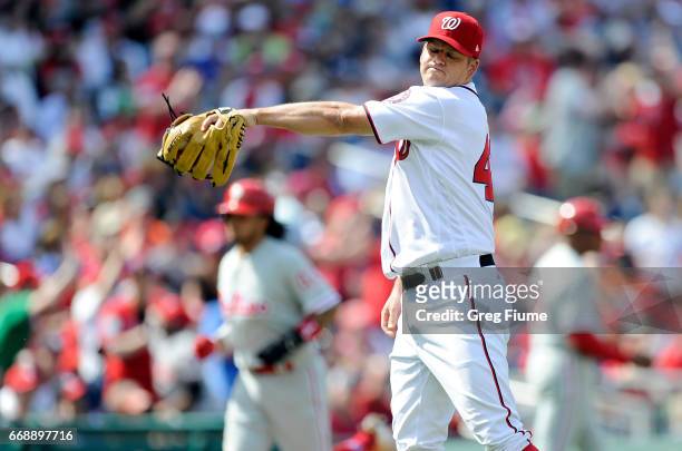 Joe Blanton of the Washington Nationals reacts after giving up a home run in the eighth inning against the Philadelphia Phillies at Nationals Park on...