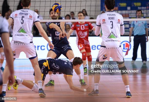 Tours Volley Ball's French middle-blocker Quentin Jouffroy, Trentino team's Italian middle-blocker Sebastian Sole, Trentino team's Italian libero...