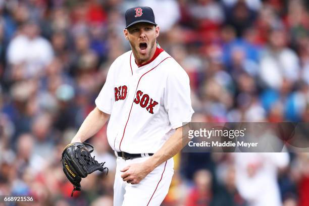 Chris Sale of the Boston Red Sox reacts as he walks to the dugout after pitching the seventh inning against the Tampa Bay Rays at Fenway Park on...