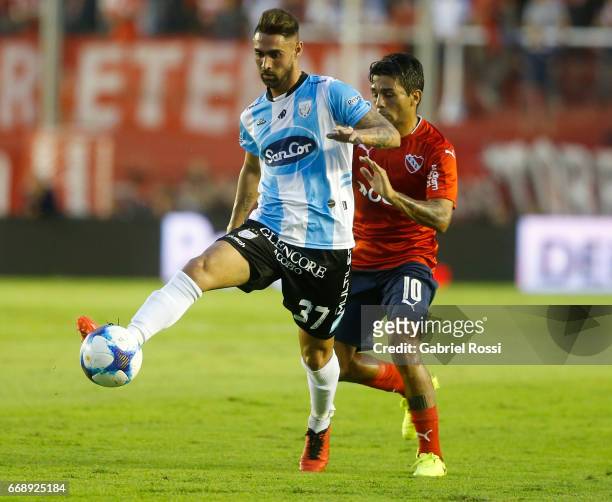 Kevin Itabel of Atletico Rafaela fights for the ball with Walter Erviti of Independiente during a match between Independiente and Atletico de Rafaela...