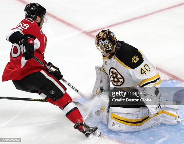 Boston Bruins goalie Tuukka Rask makes save on a Ottawa Senators left wing Mike Hoffman during the first period. The Boston Bruins visit the Ottawa...