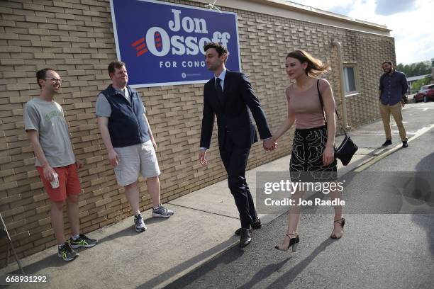 Democratic candidate Jon Ossoff arrives with his girlfriend, Alisha Kramer, to greet supporters at a campaign office as he runs for Georgia's 6th...