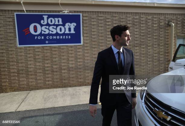 Democratic candidate Jon Ossoff arrives to greet supporters at a campaign office as he runs for Georgia's 6th Congressional District in a special...