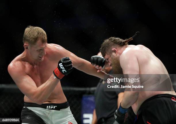 Alexander Volkov battles Roy Nelson during their Heavyweight bout on UFC Fight Night at the Sprint Center on April 15, 2017 in Kansas City, Missouri.