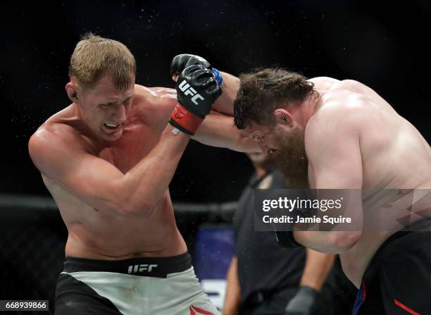 Alexander Volkov battles Roy Nelson during their Heavyweight bout on UFC Fight Night at the Sprint Center on April 15, 2017 in Kansas City, Missouri.