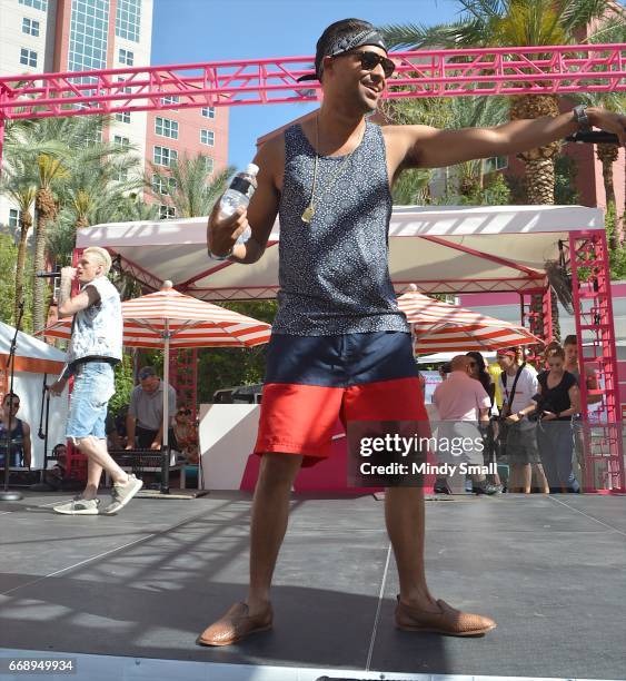 Singer Aaron Carter and singer/songwriter Louie Helgeson perform at the Go Pool at Flamingo Las Vegas on April 15, 2017 in Las Vegas, Nevada.