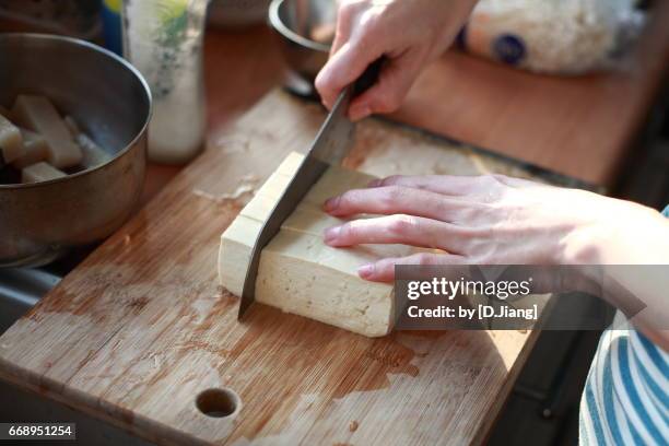 cutting tofu - tofu stock pictures, royalty-free photos & images