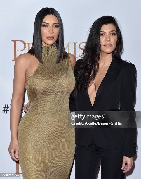 Personalities Kim Kardashian and Kourtney Kardashian arrive at the Premiere of Open Road Films' 'The Promise' at TCL Chinese Theatre on April 12,...