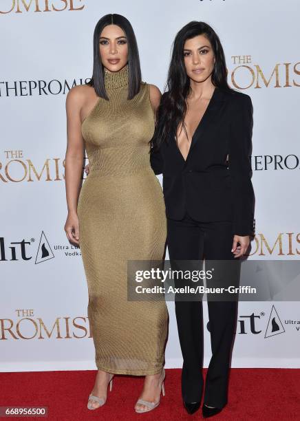 Personalities Kim Kardashian and Kourtney Kardashian arrive at the Premiere of Open Road Films' 'The Promise' at TCL Chinese Theatre on April 12,...