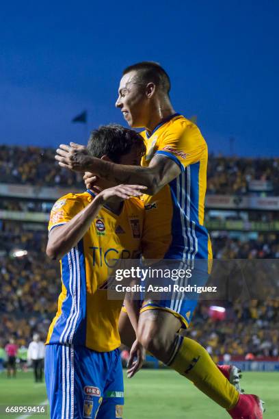 Jurgen Damm of Tigres celebrates with teammate Eduardo Vargas after scoring his team's second goal during the 14th round match between Tigres UANL...