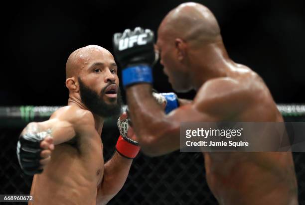 Demetrious Johnson battles Wilson Reis during their Flyweight Championship bout on UFC Fight Night at the Sprint Center on April 15, 2017 in Kansas...