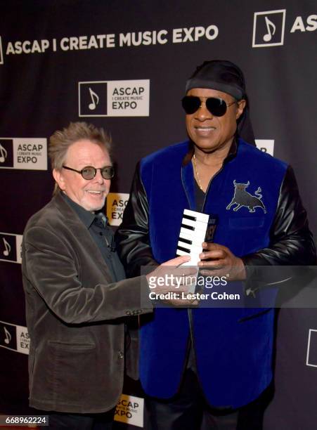 President Paul Williams and musician Stevie Wonder attend Stevie Wonder presented with "Key of Life" Award at the ASCAP "I Create Music" Expo on...