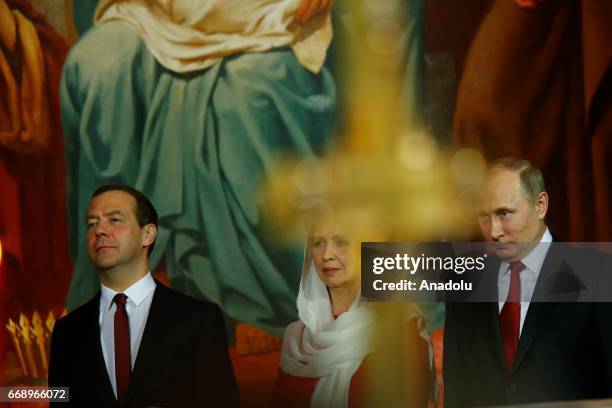 Russian President Vladimir Putin and Prime Minister Dmitry Medvedev attend the Easter service led by Patriarch Kirill of Russia in Christ the Savior...