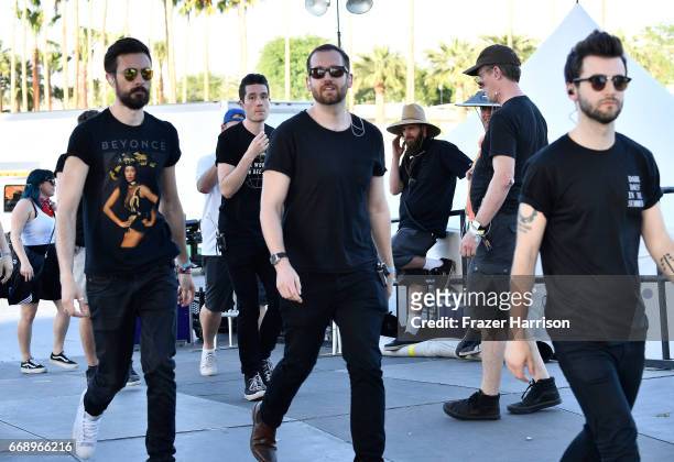 Musicians Charlie Barnes, Will Farquarson and Kyle J Simmons of Bastille backstage at the Outdoor Stage during day 2 of the Coachella Valley Music...