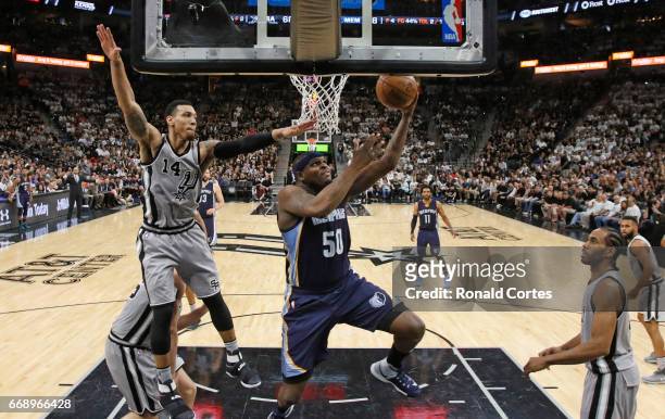 Zach Randolph of the Memphis Grizzlies drives past Danny Green of the San Antonio Spurs in Game One of the Western Conference Quarterfinals during...