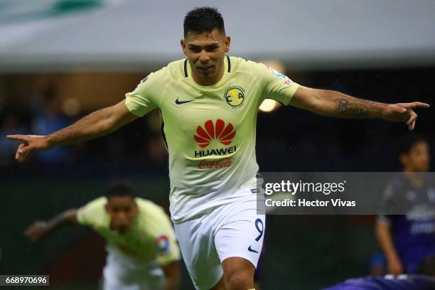 Silvio Romero of America celebrates after scoring the first goal of his team during the 14th round match between America and Queretaro as part of the...