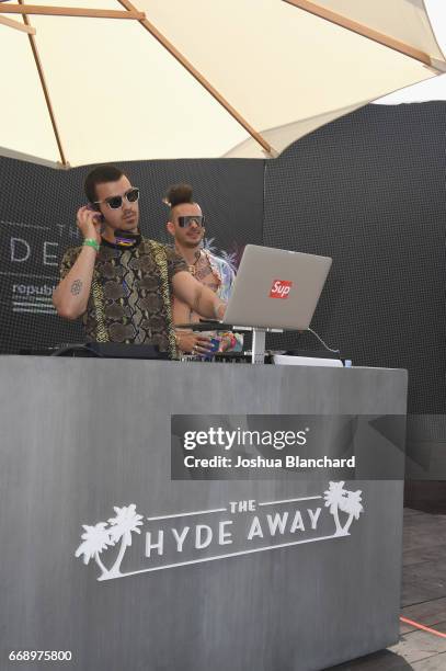 Joe Jonas and Cole Whittle of DNCE perform during The Hyde Away, hosted by Republic Records & SBE, presented by Hudson and bareMinerals during...