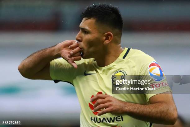 Silvio Romero of America celebrates after scoring the first goal of his team during the 14th round match between America and Queretaro as part of the...