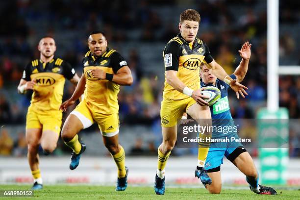 Beauden Barrett of the Hurricanes makes a break during the round eight Super Rugby match between the Blues and the Hurricanes at Eden Park on April...