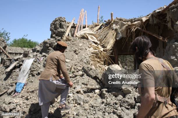 Debris of a collapsed building is seen in the Acin district after The US military dropped America's most powerful non-nuclear bomb on Daesh targets...