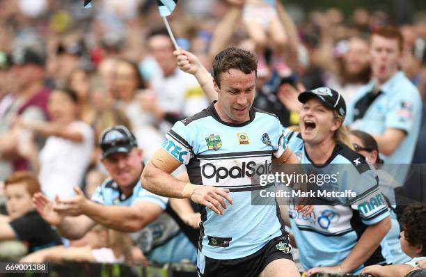 James Maloney of the Sharks celebrates scoring a try during the round seven NRL match between the Penrith Panthers and the Cronulla Sharks at Pepper...