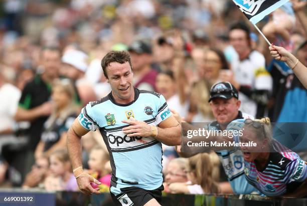 James Maloney of the Sharks celebrates scoring a try during the round seven NRL match between the Penrith Panthers and the Cronulla Sharks at Pepper...