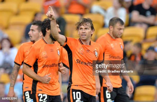 Brett Holman of the Roar celebrates scoring a goal during the round 27 A-League match between the Brisbane Roar and the Wellington Phoenix at Suncorp...