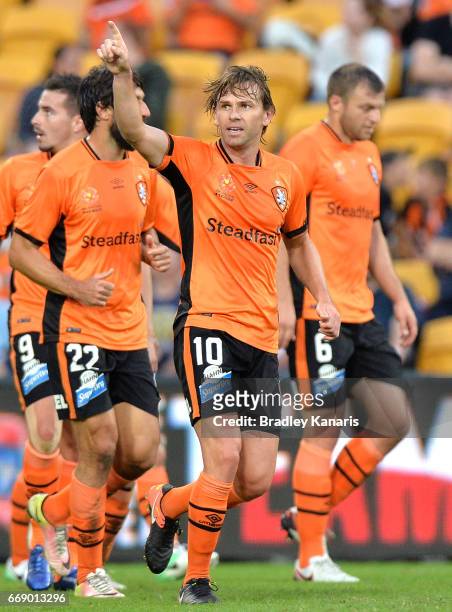 Brett Holman of the Roar celebrates scoring a goal during the round 27 A-League match between the Brisbane Roar and the Wellington Phoenix at Suncorp...