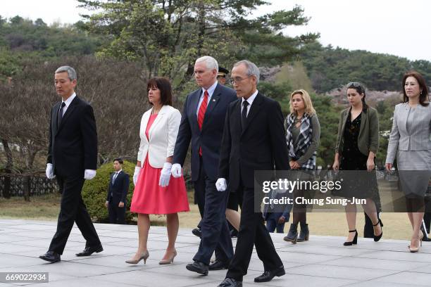 Vice President Mike Pence and his wife Karen Pence visit at Seoul National Cemetery on April 16, 2017 in Seoul, South Korea. During the three day...