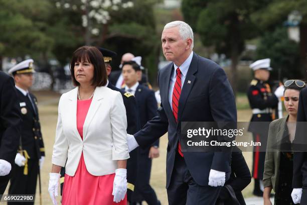 Vice President Mike Pence and his wife Karen Pence visit at Seoul National Cemetery on April 16, 2017 in Seoul, South Korea. During the three day...